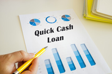 Financial concept about Quick Cash Loan with phrase on the chart sheet.
