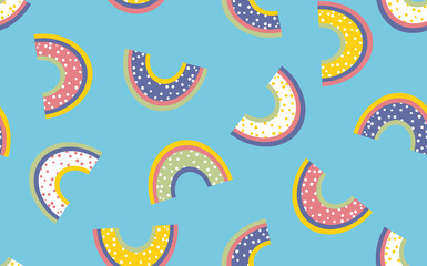 Trendy seamless pattern with colorful rainbow on color background. Design for invitation, poster, card, fabric, textile, fabric. Cute holiday illustration for baby. Doodle style