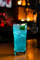 Blue cocktail with ice cubes, Blue lagoon non-alcoholiccoctail coctail