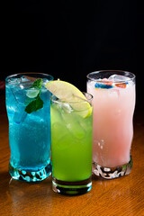 Popular alcoholic cocktails composition. Many cocktail drinks Blue hawaiian, tropical Martini, margarita