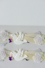 wedding ribbon with doves and flowers and purple hearts