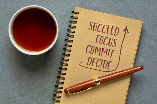 decide, commit, focus, succeed word abstract - handwriting in a notebook with a cup of tea, success, determination and personal development concept