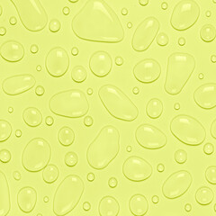 Water drops on a pastel yellow background. Water texture close up. Backdrop glass covered with drops of water. Water bubbles.