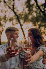 glasses of wine and a couple