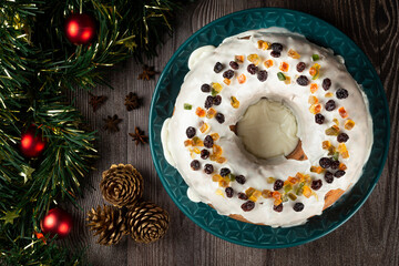 Christmas cake with fondant and candied fruit.
