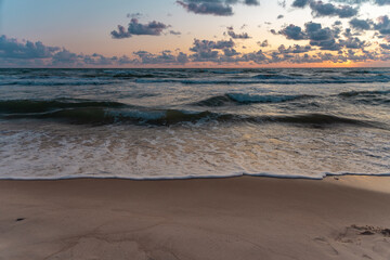 wind breeze in the beach with sea waves in evening