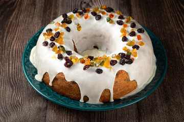 Christmas cake with fondant and candied fruit.