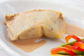 Traditional dish from the city of Popayan in Colombia called tamales de pipian