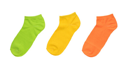 Three multi-colored socks isolated on a white background. Flat lay.