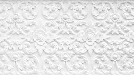 Pattern of flower carved on cement wall background