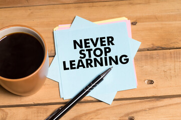 Never Stop Learning words written on notepad