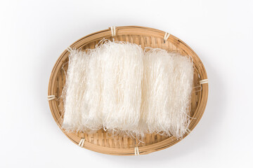 Raw bean vermicelli or dry glass noodles on white background - obrazy, fototapety, plakaty