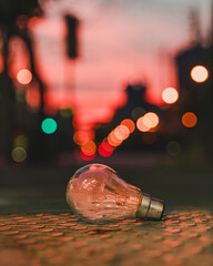 Old Light bulb on the street beautiful bokeh background which show idea concept with innovation and inspiration.