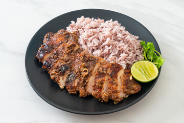 spicy grilled Jamaican jerk chicken with rice