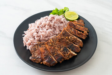 spicy grilled Jamaican jerk chicken with rice