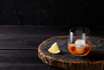 Cocktail with on dark wooden table