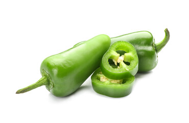 Green jalapeno peppers and slices on white background