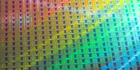 Silicon Wafer with microchips used in electronics for the fabrication of integrated circuits.