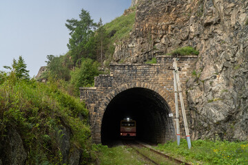 Train rides in a tunnel on the Circum-Baikal Railway
