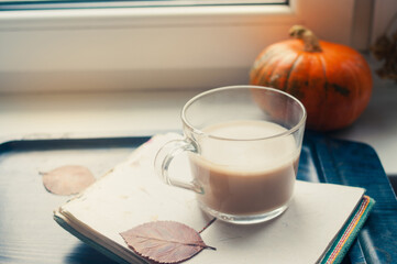 One pumpkin squash and a latte coffee made with with plant based oat soya or almond milk  with...