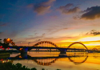 Fototapeta na wymiar Photo of sunset sky and big bridge in Vietnam