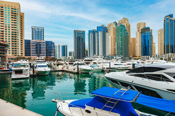 Naklejka premium Dubai Marina skyscrapers and port in Dubai, United Arab Emirates