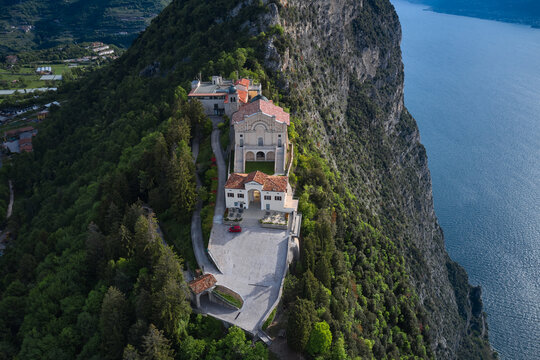 Catholic Church Eremo di Montecastello. Aerial view of the church on the mountain. Lake Garda, Italy. Top view of the Eremo di Montecastello church. Aerial panorama of Montecastello.