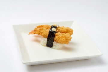 fried prawn sushi on a plate