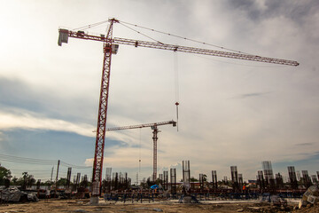 Construction crane tower on blue sky background