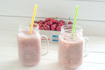 strawberry cherry smoothie in a glass