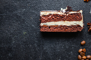 cake slice piece chocolate cream nut, coffee syrup honey sweet dessert holiday treat meal snack copy space food background rustic