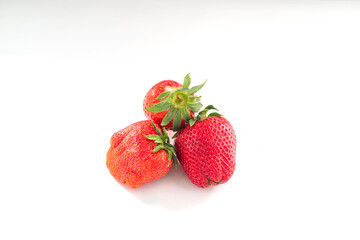 macro photo of strawberries on a light background