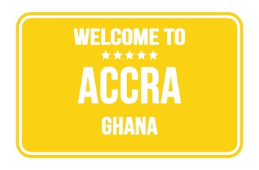 WELCOME TO ACCRA - GHANA, words written on yellow street sign stamp