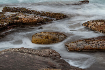 silky water over rocks
