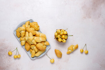 Homemade cookies with sweet yellow cherries.