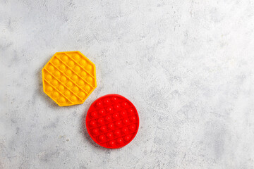 Obraz na płótnie Canvas Trendy children's flexible sensory colorful toy pop it.