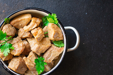 pork stewed meat garnish meal snack on the table copy space food background rustic. top view