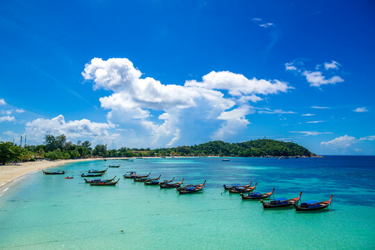 Beautiful Andaman sea, Tropical Turquoise clear blue sea and white sand beach on pattaya beach with blue sky background at Lipe Island, Satun, Thailand -  summer vacation travel
