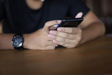 person using phone in the office