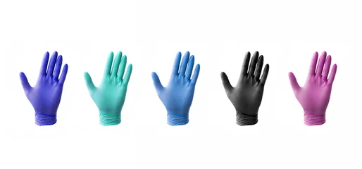 Poster Assortment of nitrile or latex medical gloves isolated on white background with no hands © MariyaL