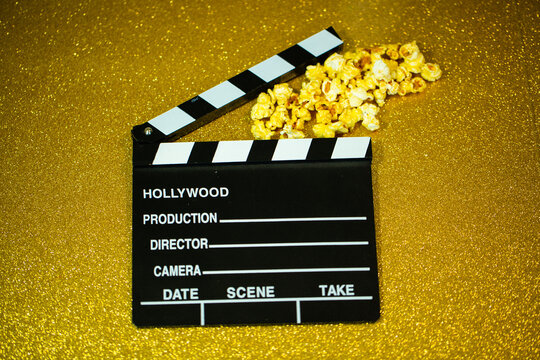 Cinema Hatch With Popcorn, Covid Test And Mask, On Golden Background