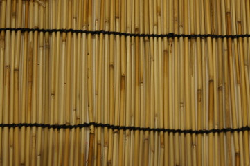 Bamboo wall background natural wooden texture. brown tone bamboo plank.