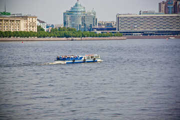 Obraz premium passenger ship in the middle of the river close up 