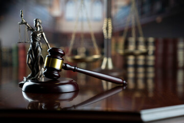 Law and justice concept. Law symbols composition: judge’s gavel, Themis  statue and scale.