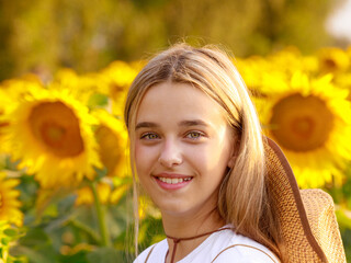 12 year old girl on a field of sunflowers