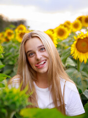 12 year old girl on a field of sunflowers