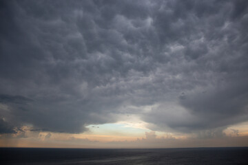 dark clouds over the river
