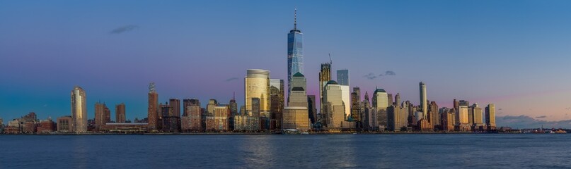 Manhattan skyline at night with dramatic sky , New York City