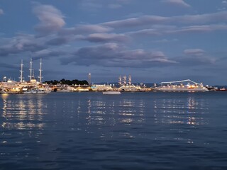 Naklejka premium Scenic view of port at night. Beautiful twilight pastel colors background in Split, Croatia. Sail boats and yachts in the evening harbor of Adriatic Sea.