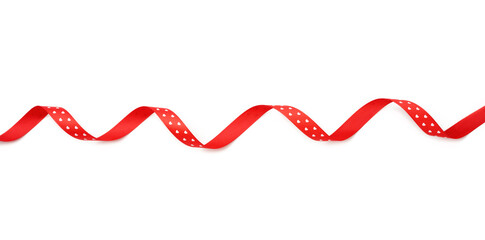 swirling red silk ribbon on white background